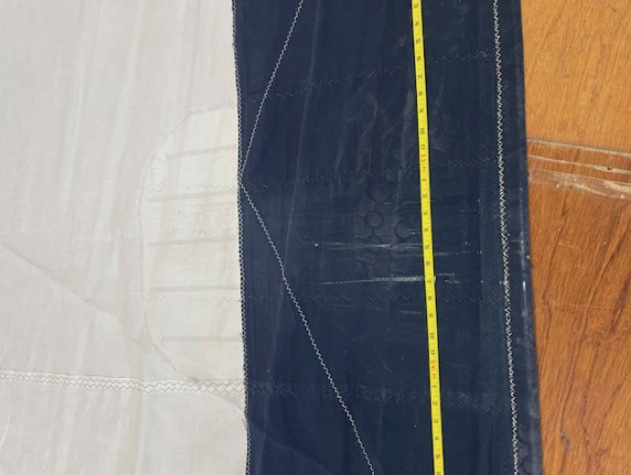 Signs of spreader chafe on this UV cover which has also been restitched for sun damaged thread